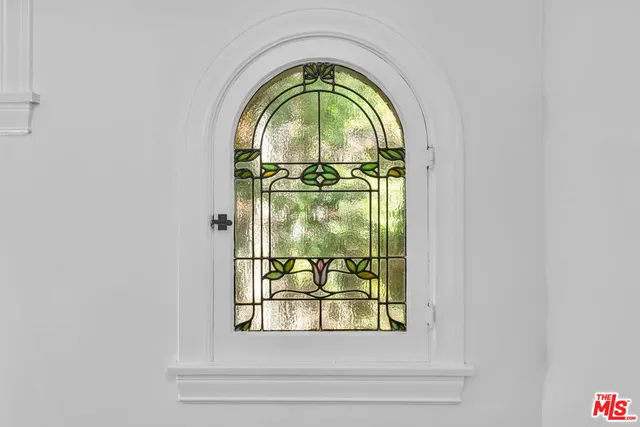 a view of hallway with wooden floor