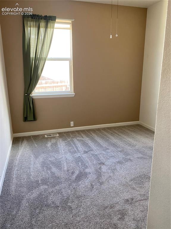9362 St.George Road Peyton, CO 80831 - Photo 13 of 32 an empty room with a window