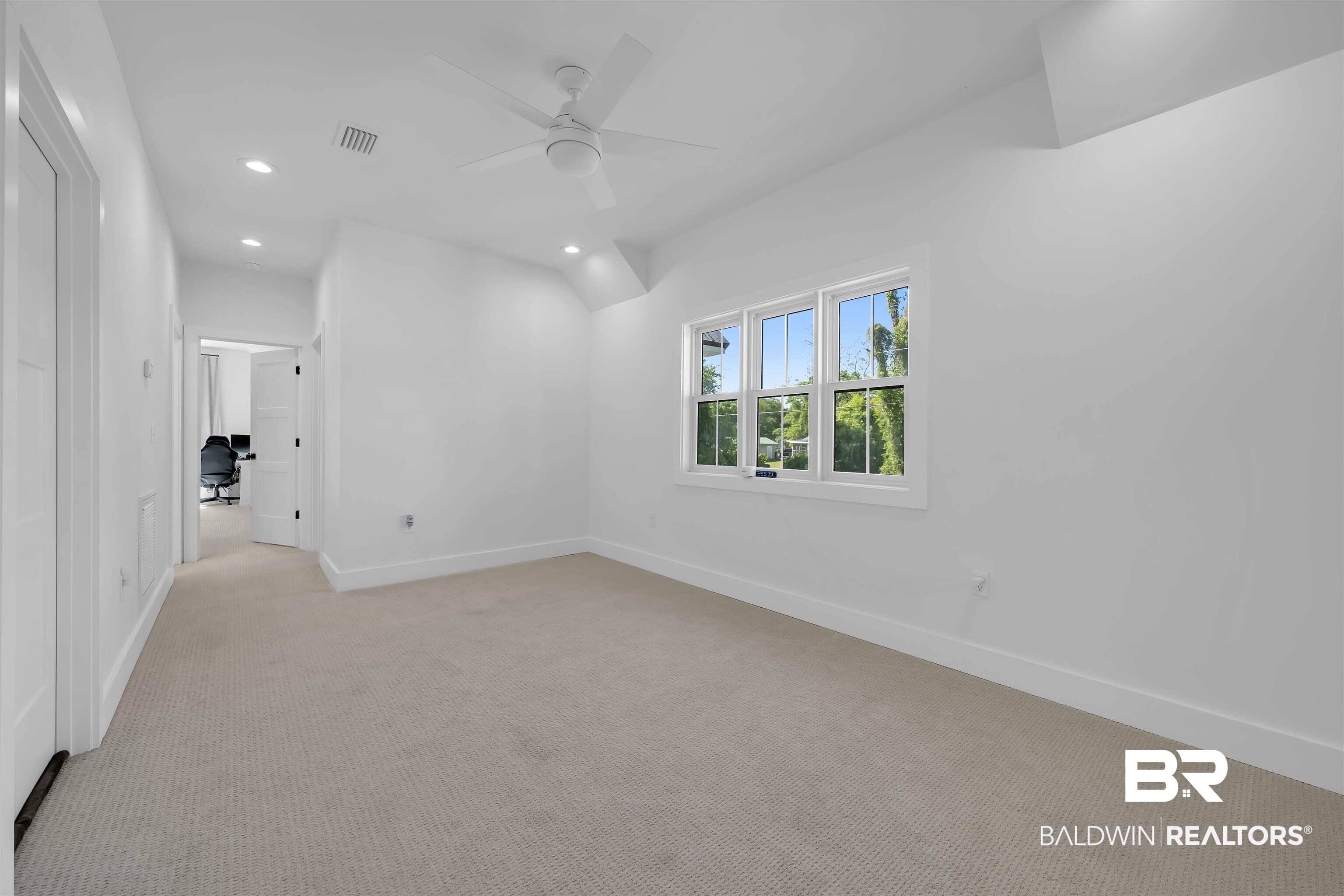 19058 James Road Gulf Shores, AL 36542 - Photo 30 of 49 Unfurnished room featuring recessed lighting, light carpet, ceiling fan, and lofted ceiling