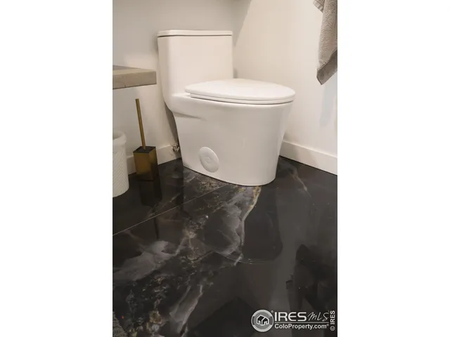 a bathroom with a toilet