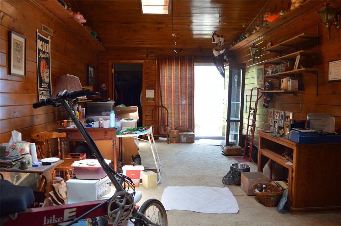 11 Buckeye Brook Road Charlestown, RI 02813 - Photo 29 of 43 Breezeway / Livingroom