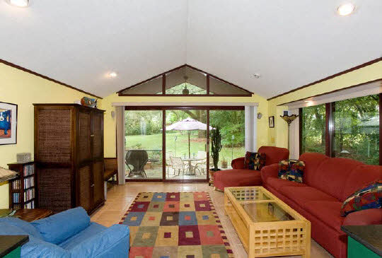 2007 Valley Road Rockford, IL 61107 - Photo 4 of 6 a living room with furniture and a floor to ceiling window