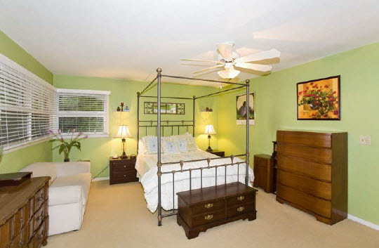 2007 Valley Road Rockford, IL 61107 - Photo 5 of 6 a bedroom with a bed window and couch