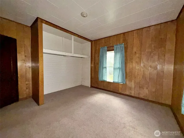 a kitchen with stainless steel appliances a refrigerator sink and cabinets