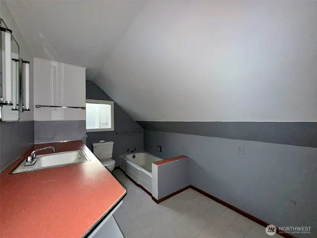 an empty room with closet