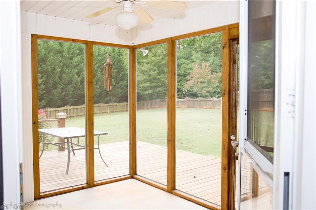 879 Ridge View Terrace Rural Hall, NC 27045 - Photo 14 of 18 Screened porch overlook deck and fenced yard.
