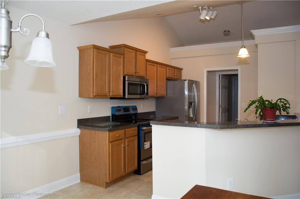 879 Ridge View Terrace Rural Hall, NC 27045 - Photo 6 of 18 Kitchen with new stainless steel appliances.