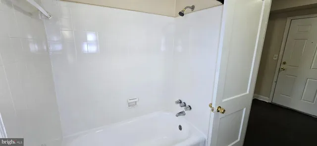 a bathroom with a bathtub