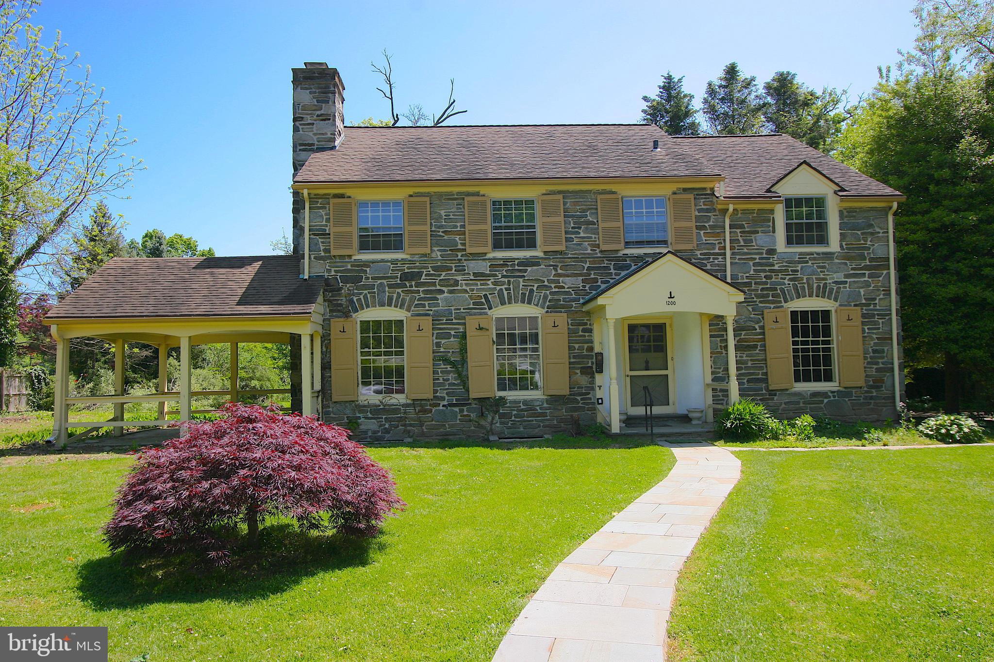 1200 Knox Road Wynnewood, PA 19096 - Photo 1 of 32 Main Line Center Hall Stone Colonial