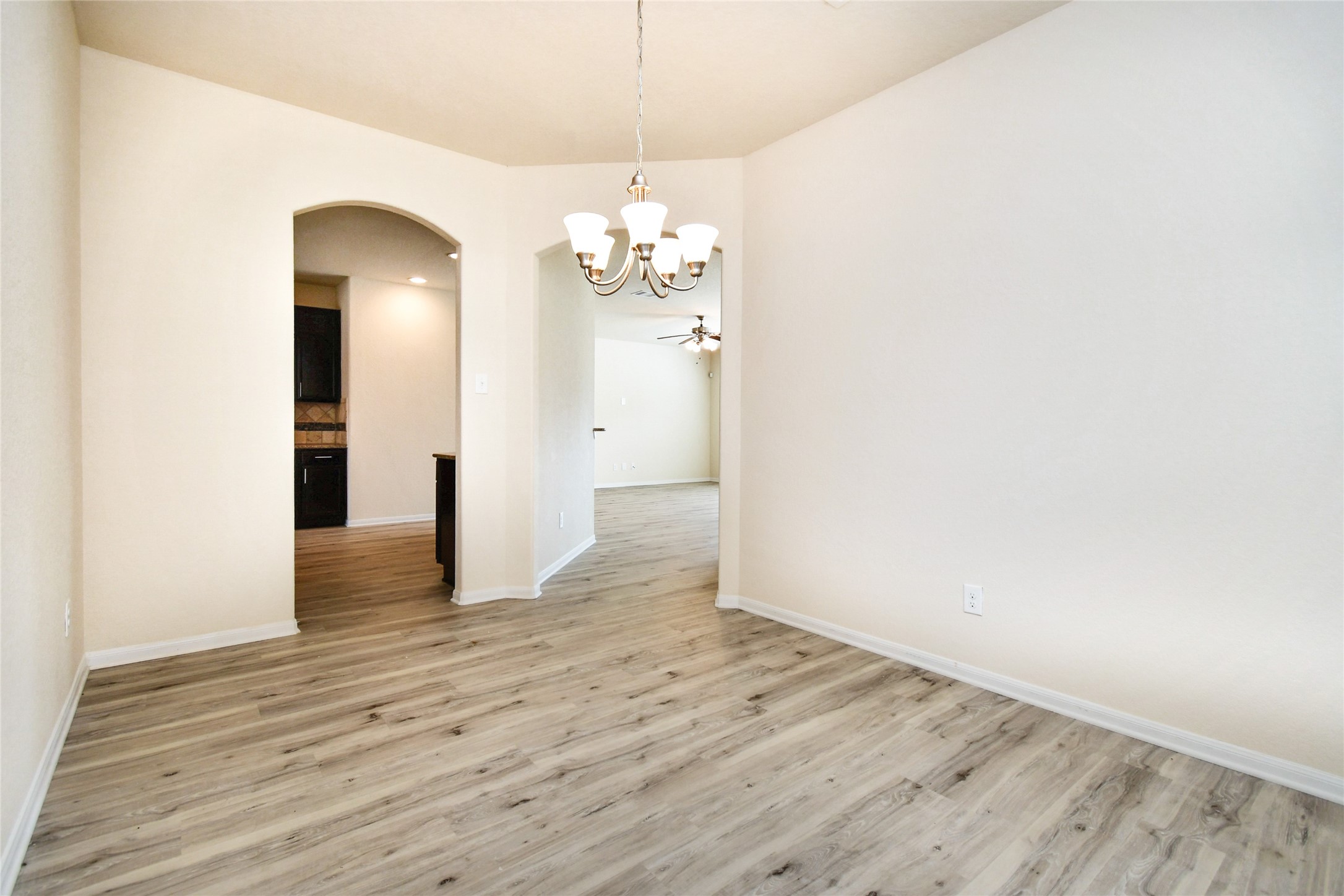3227 Thicket Path Way Katy, TX 77493 - Photo 11 of 40 wooden floor in an empty room