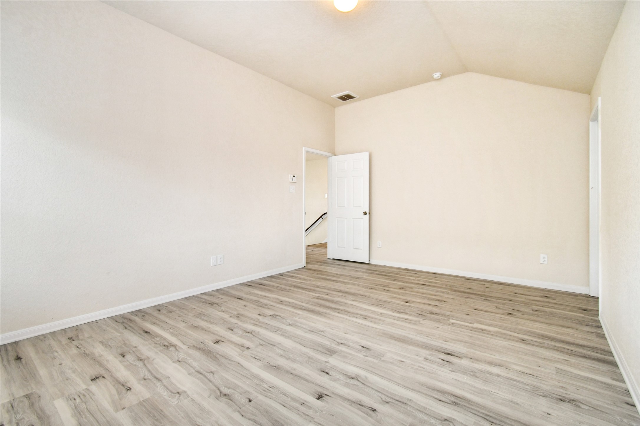 3227 Thicket Path Way Katy, TX 77493 - Photo 18 of 40 a view of empty room with wooden floor