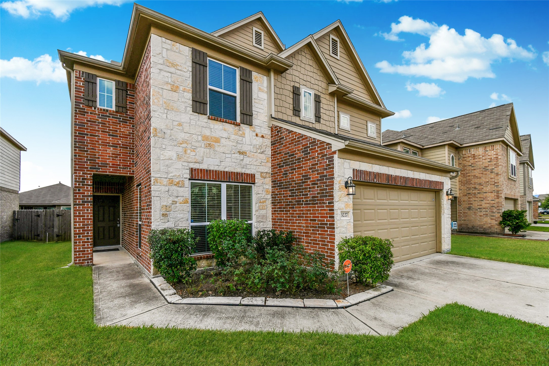 3227 Thicket Path Way Katy, TX 77493 - Photo 2 of 40 a front view of a house with a yard