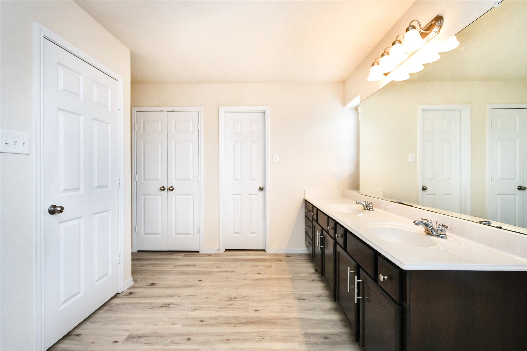 3227 Thicket Path Way Katy, TX 77493 - Photo 21 of 40 a bathroom with a double vanity sink and a mirror
