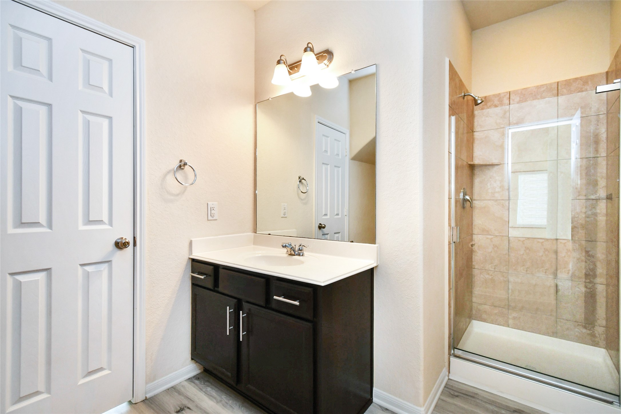 3227 Thicket Path Way Katy, TX 77493 - Photo 25 of 40 a bathroom with a sink a mirror and a shower