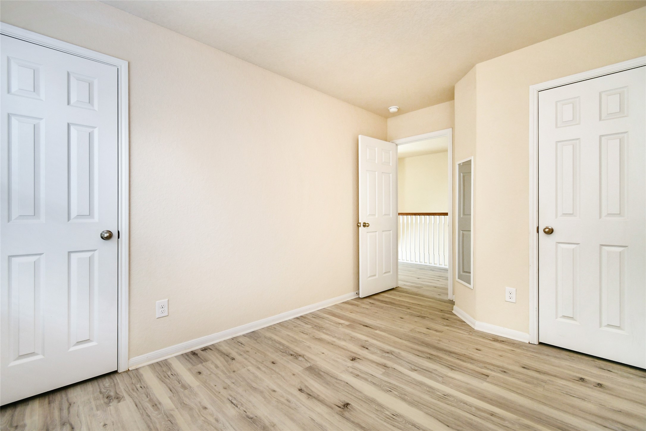 3227 Thicket Path Way Katy, TX 77493 - Photo 27 of 40 an empty room with wooden floor