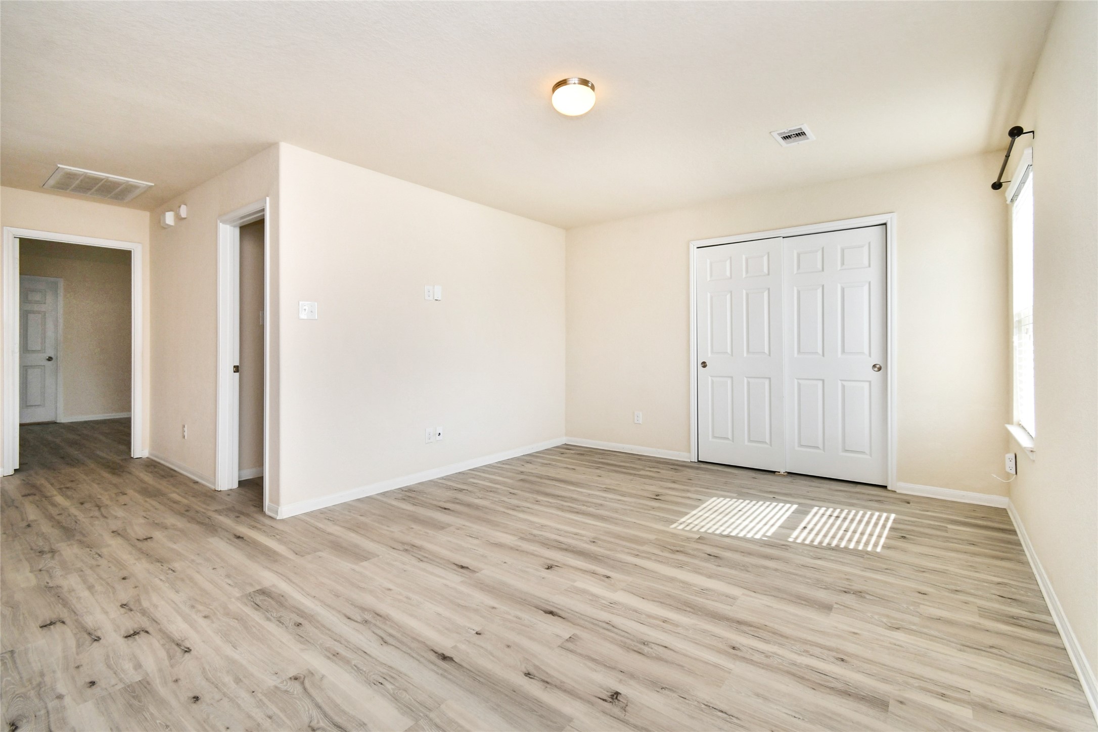 3227 Thicket Path Way Katy, TX 77493 - Photo 28 of 40 a view of an empty room with wooden floor