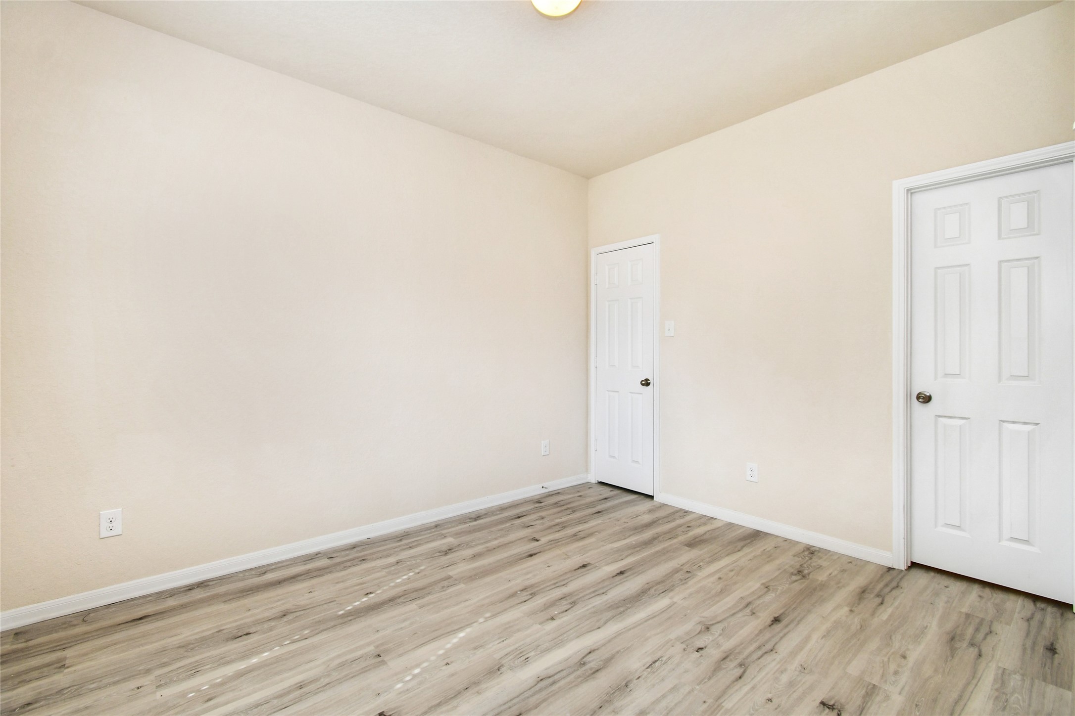 3227 Thicket Path Way Katy, TX 77493 - Photo 29 of 40 an empty room with wooden floor