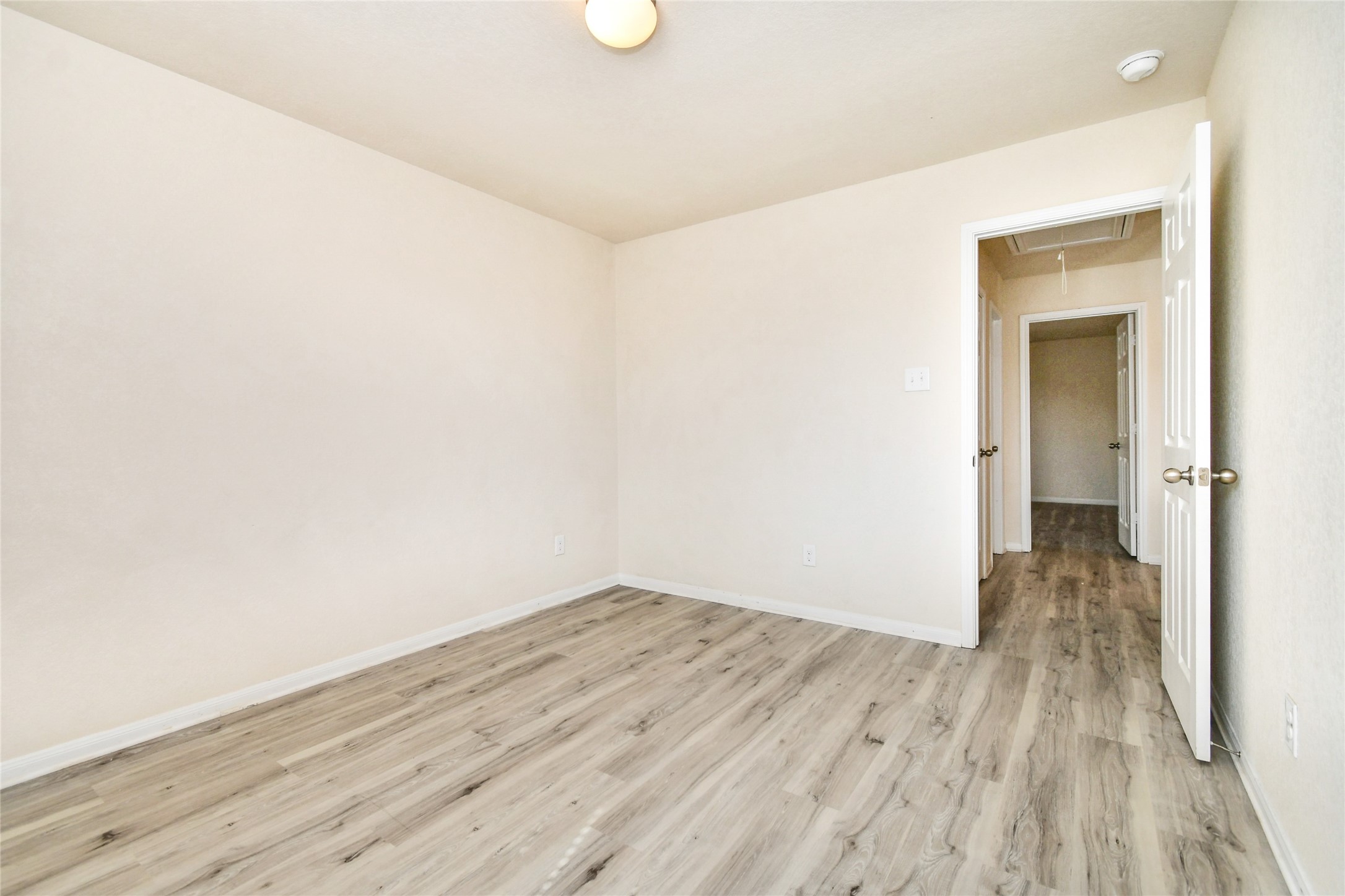 3227 Thicket Path Way Katy, TX 77493 - Photo 35 of 40 a view of a room with wooden floor
