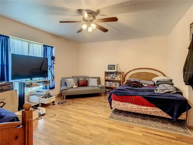a bathroom with a sink mirror vanity and toilet