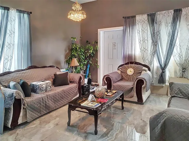 a bedroom with a bed and furniture