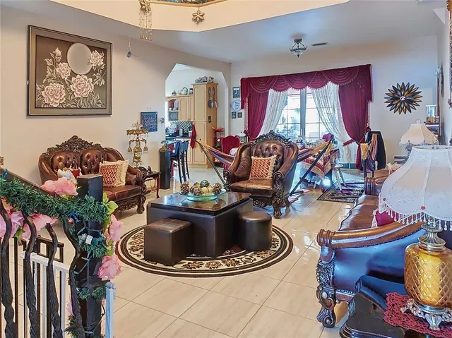 a kitchen with stainless steel appliances kitchen island granite countertop a sink and cabinets