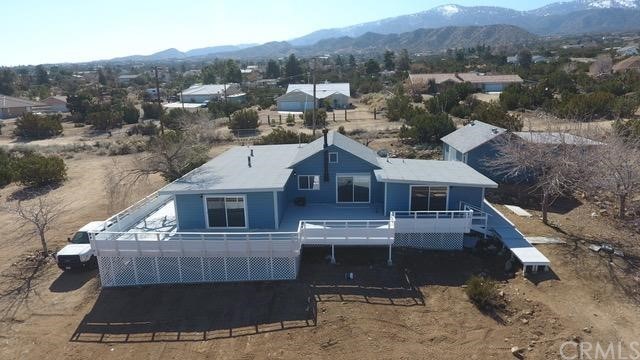 575 Pinon Road Pinon Hills, CA 92372 - Photo 1 of 1 an aerial view of a house with a yard