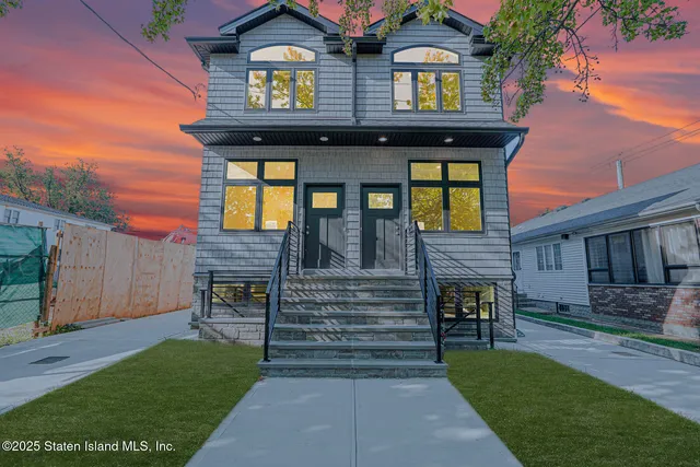 a front view of house with yard