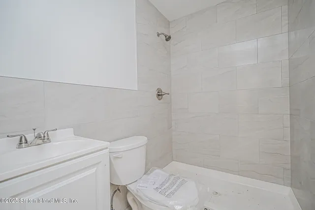 a bathroom with a sink and toilet
