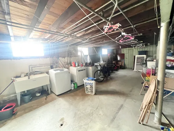 a view of a room with storage and utility room