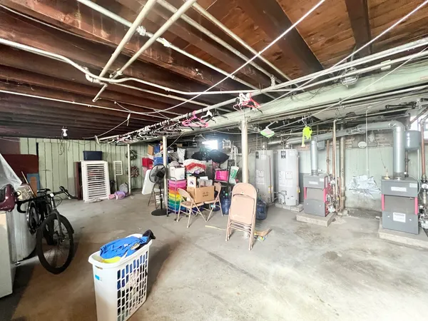 a view of a storage room with furniture