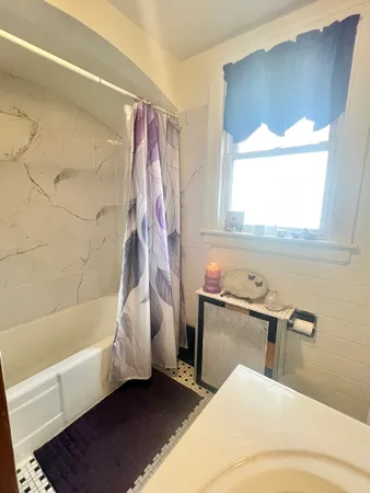 a bathroom with a sink and a bathtub