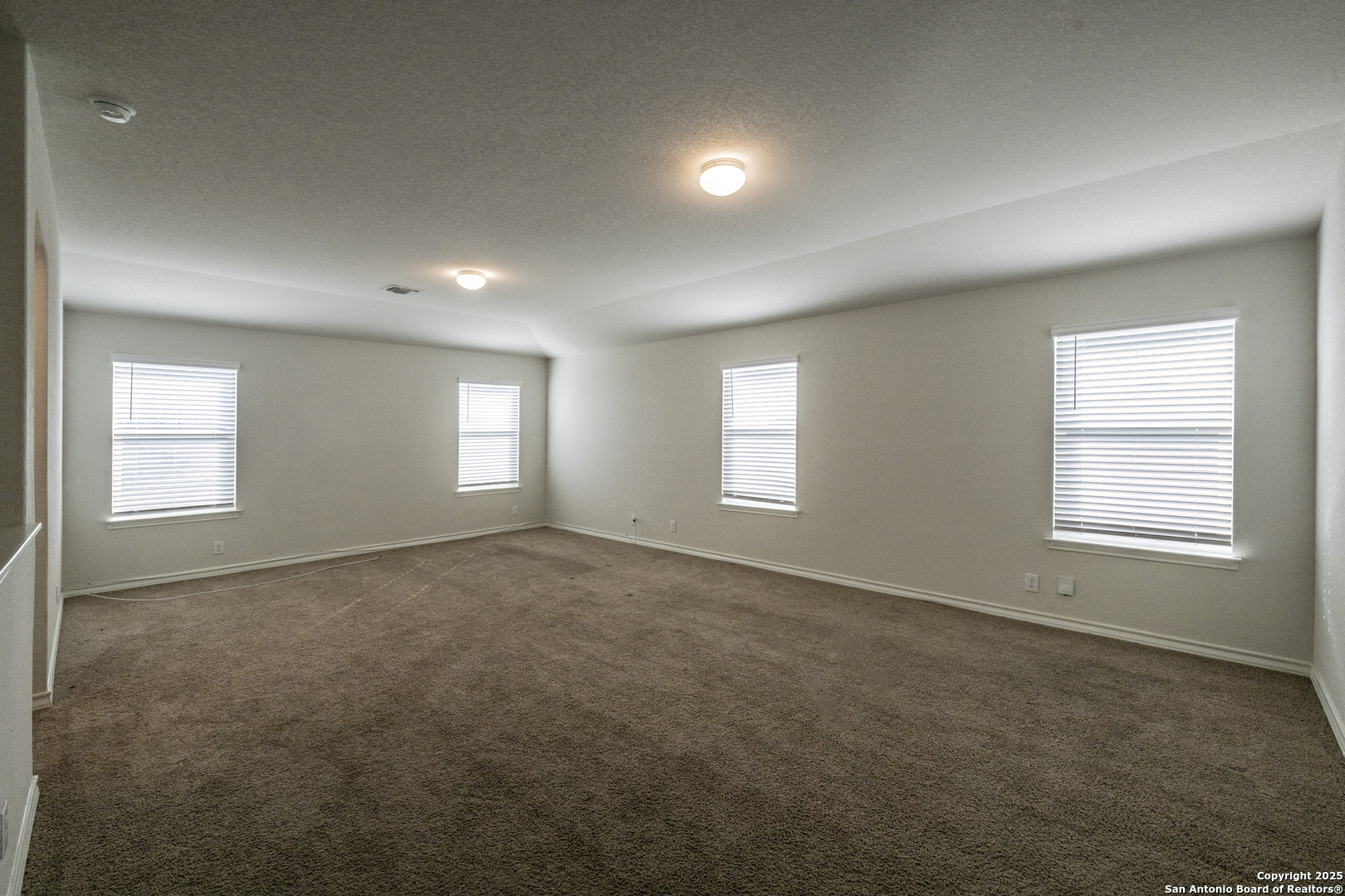 5914 Lazo Valley San Antonio, TX 78244 - Photo 26 of 40 a view of empty room with windows