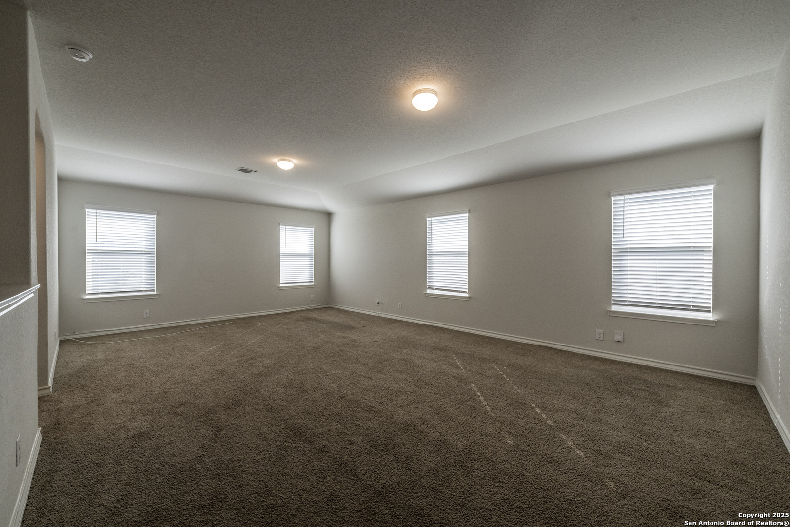 5914 Lazo Valley San Antonio, TX 78244 - Photo 30 of 40 a view of empty room with windows
