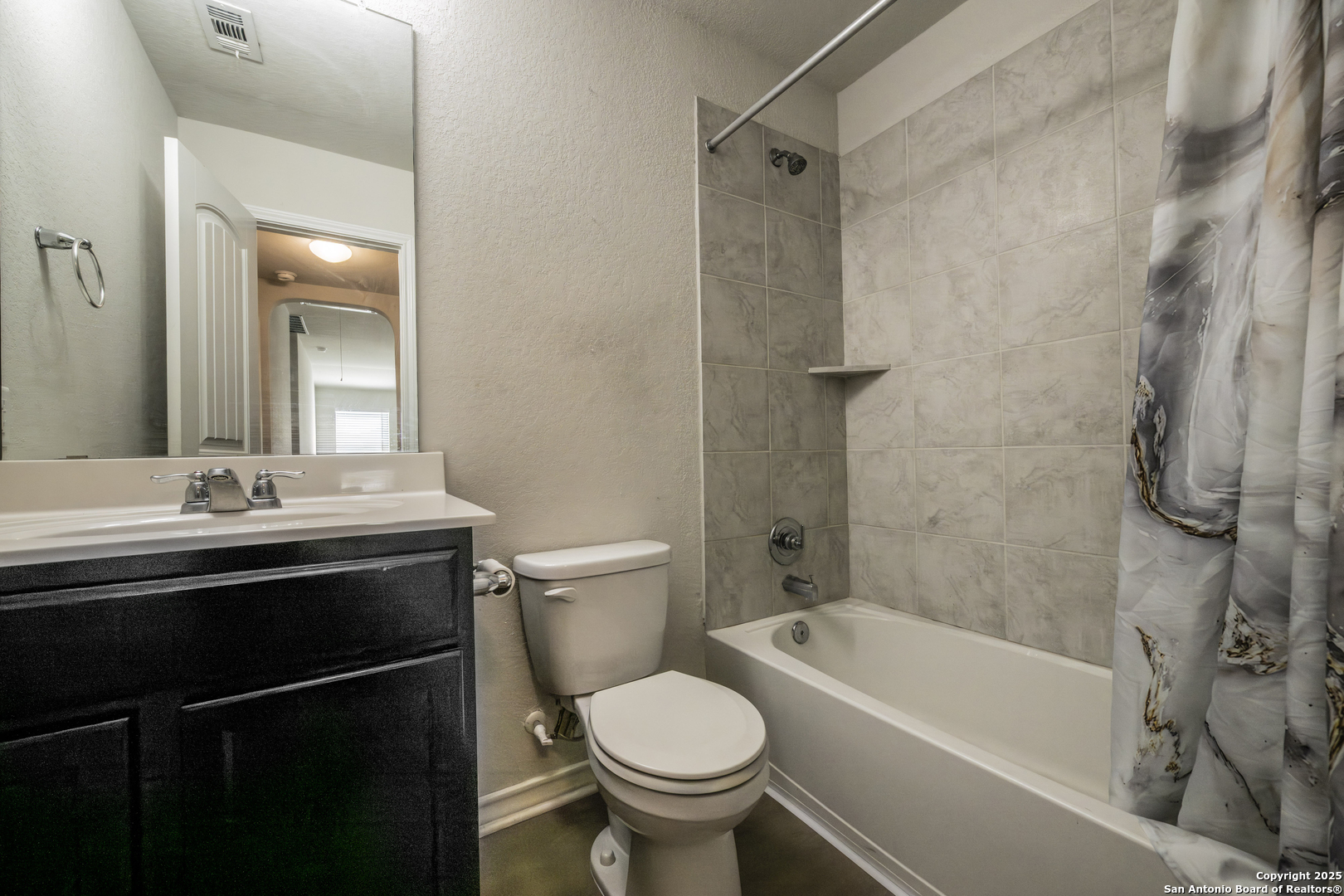 5914 Lazo Valley San Antonio, TX 78244 - Photo 36 of 40 a bathroom with a sink toilet and shower