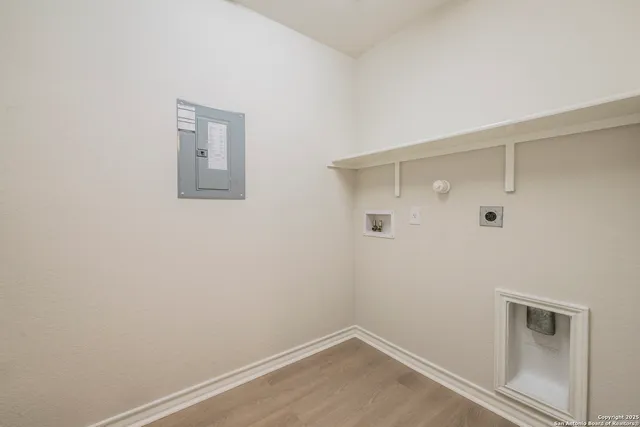 a view of a room that has a window in it