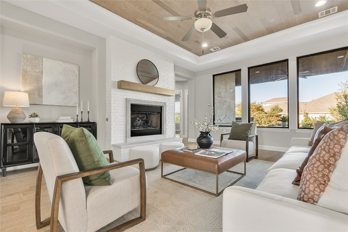 1700 Jackpot Run Leander, TX 78641 - Photo 15 of 40 a living room with furniture and a fireplace
