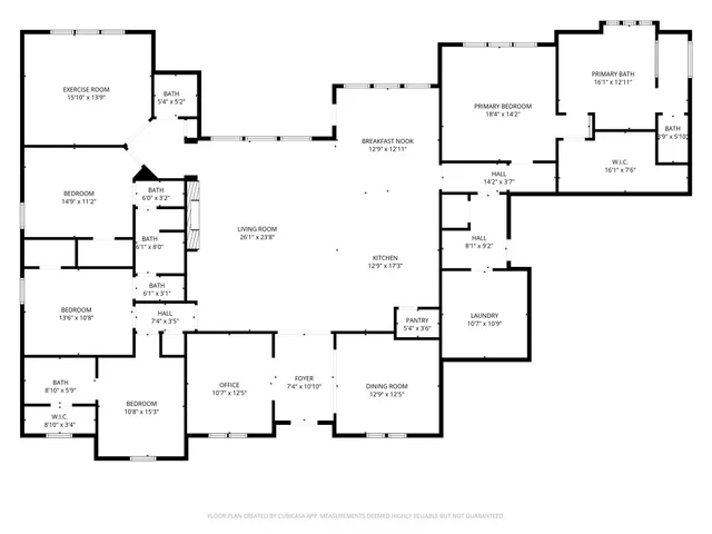 a front view of a house with a yard outdoor seating and garage