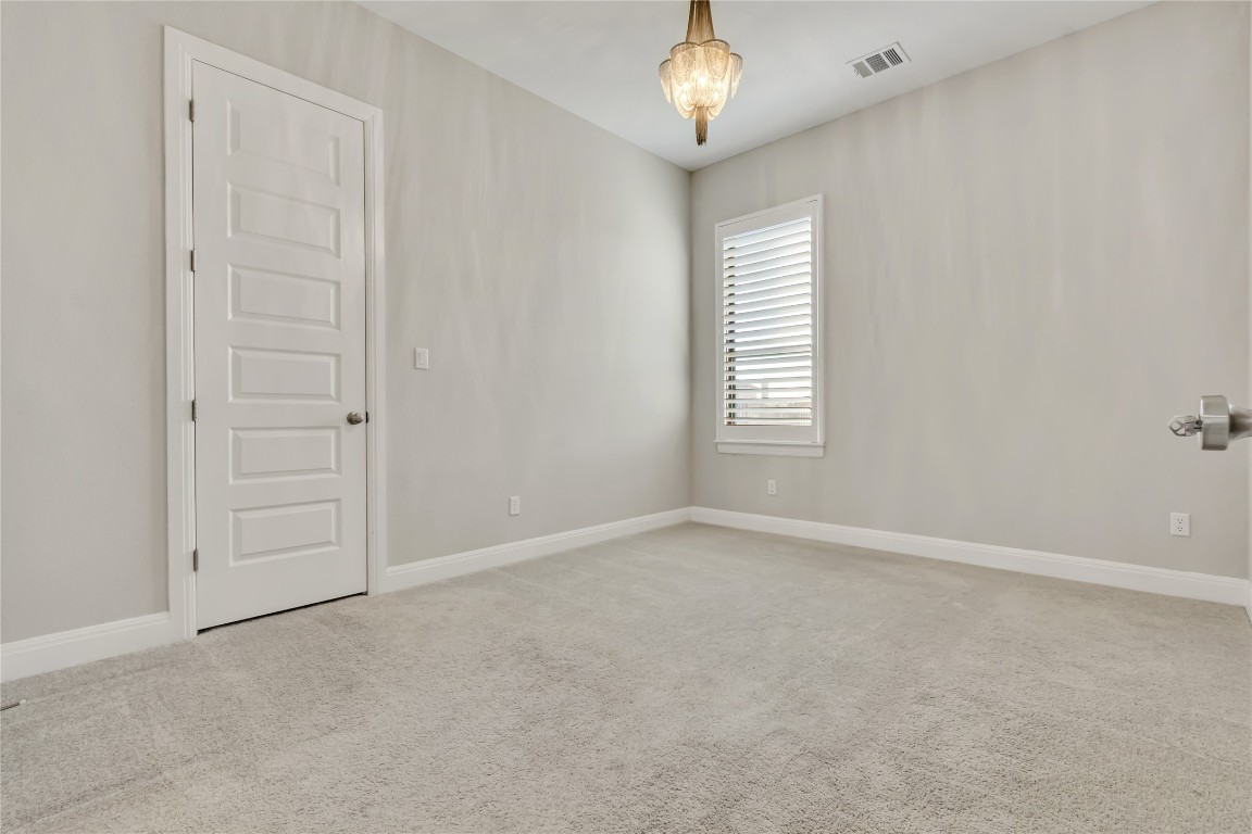 1700 Jackpot Run Leander, TX 78641 - Photo 34 of 40 an empty room with windows