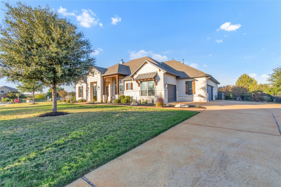 1700 Jackpot Run Leander, TX 78641 - Photo 4 of 40 a view of house with yard and green space