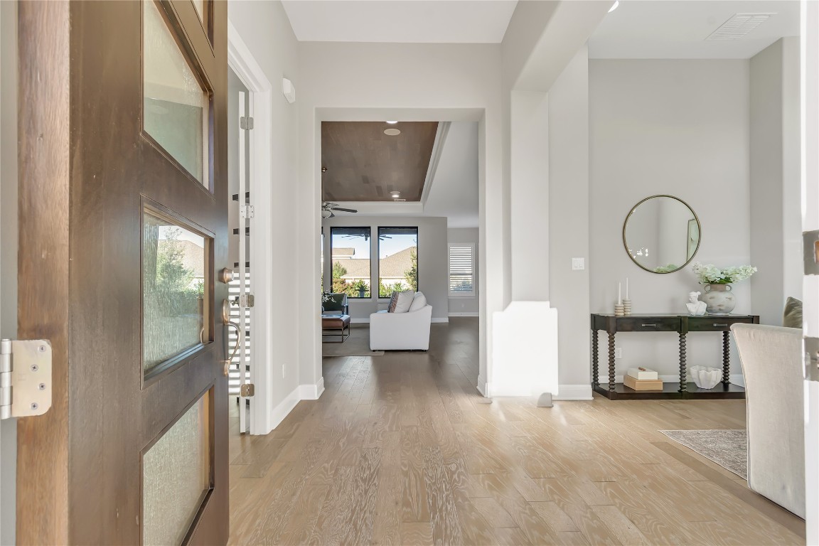 1700 Jackpot Run Leander, TX 78641 - Photo 5 of 40 a living room with furniture and a fireplace