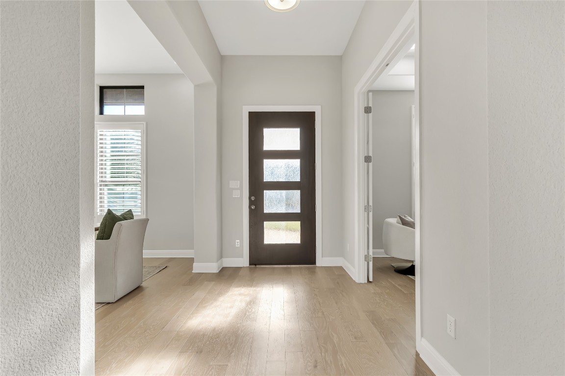 1700 Jackpot Run Leander, TX 78641 - Photo 6 of 40 an empty room with windows and closet