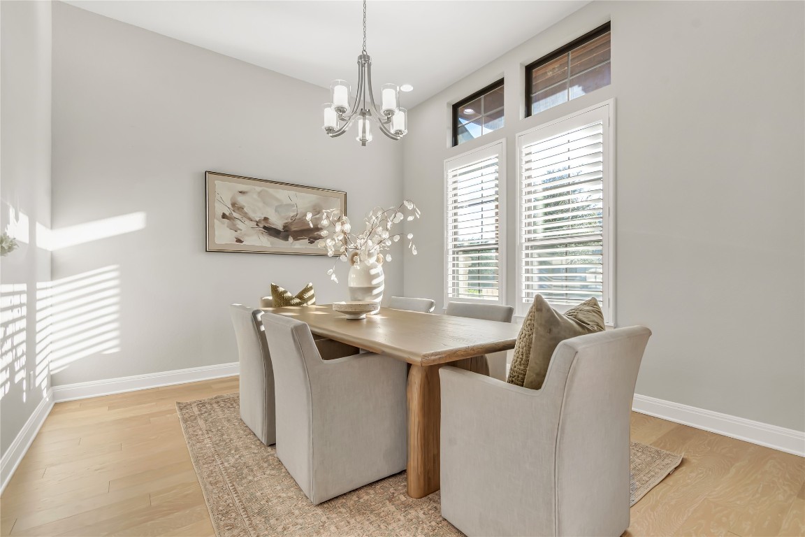 1700 Jackpot Run Leander, TX 78641 - Photo 9 of 40 a view of a dining room with furniture and window