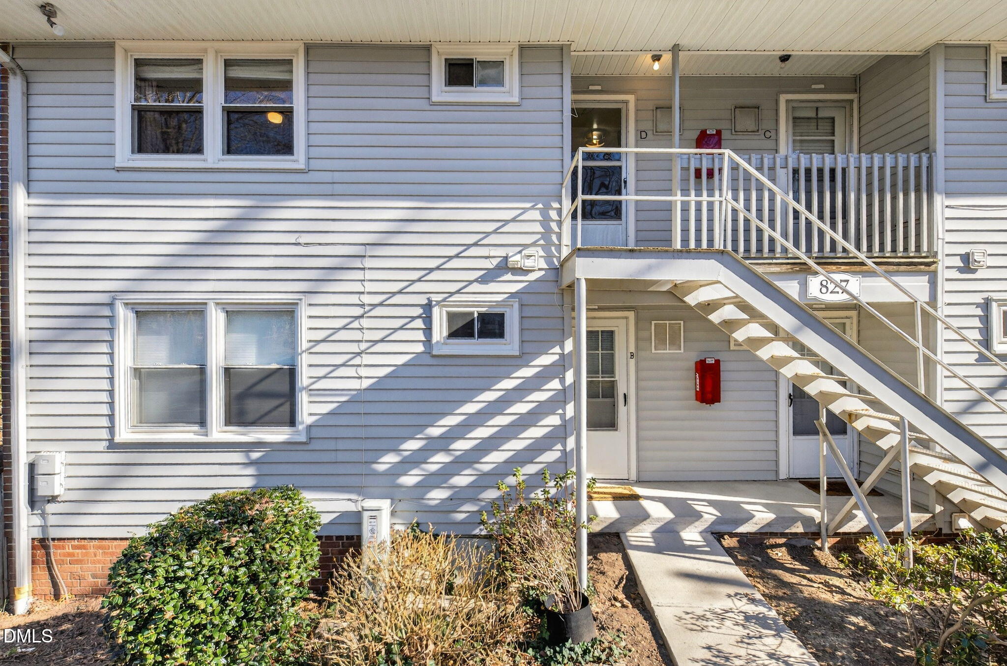 827 Daniels Street, Unit D Raleigh, NC 27605 - Photo 15 of 15 a balcony view with a garden