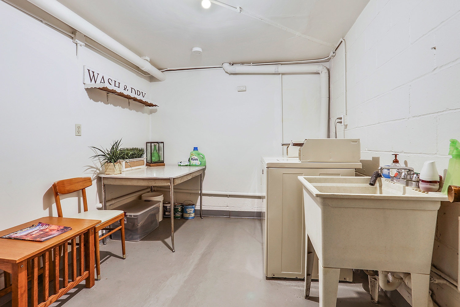 512 Porter Street, Unit B Lemont, IL 60439 - Photo 14 of 22 a room with a table chairs and a refrigerator