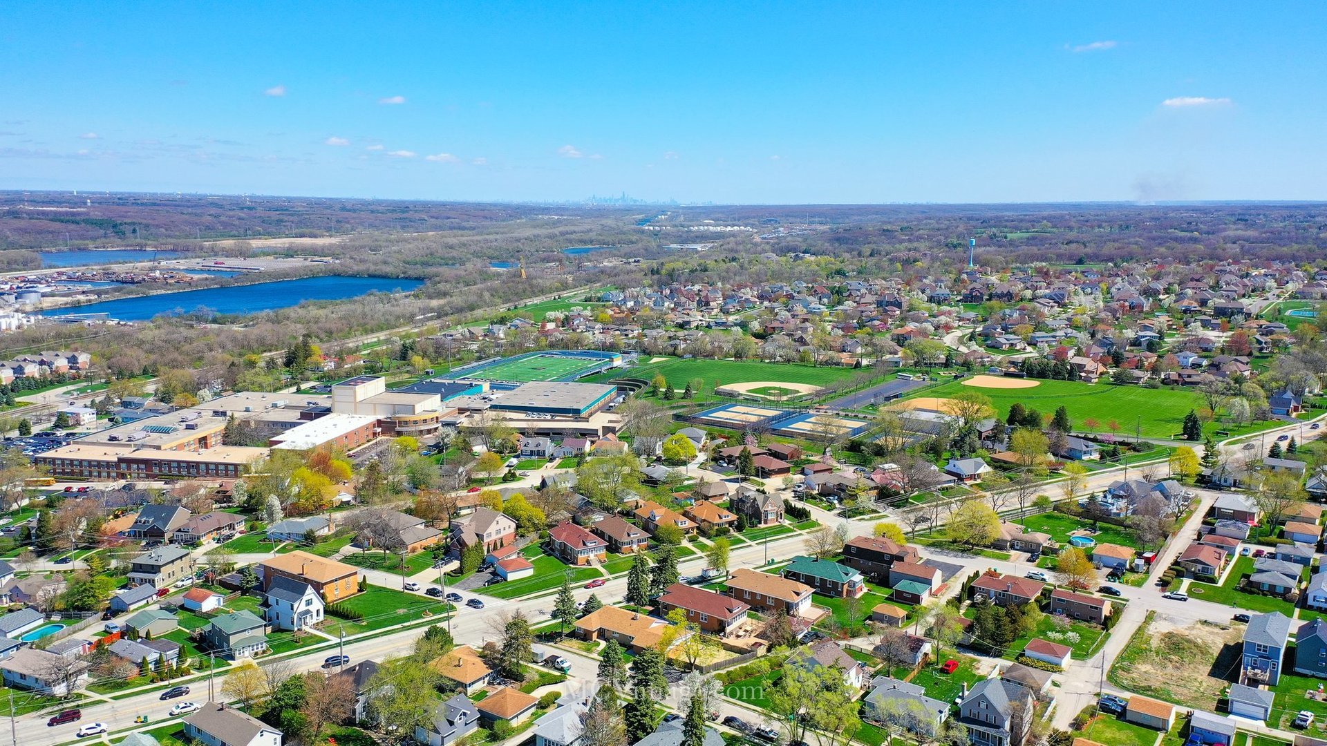 512 Porter Street, Unit B Lemont, IL 60439 - Photo 20 of 22 an aerial view of residential houses with outdoor space and trees