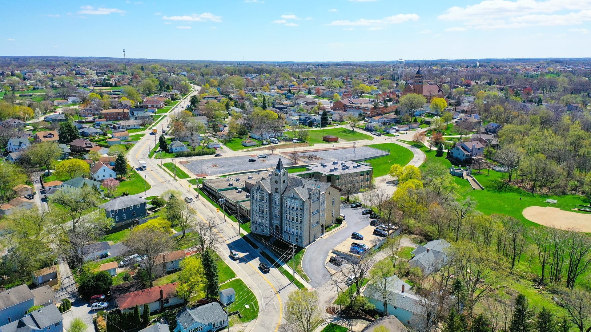 512 Porter Street, Unit B Lemont, IL 60439 - Photo 21 of 22 an aerial view of a city with lots of residential buildings