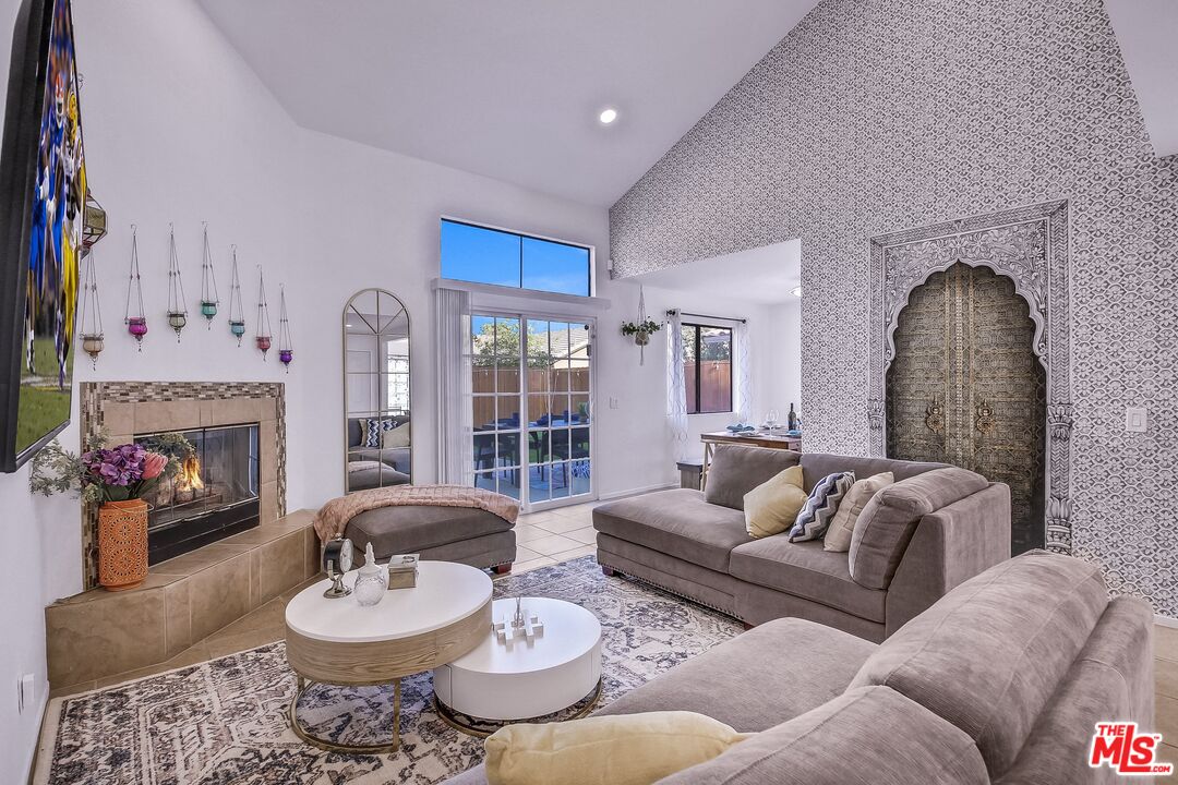 45808 Sutter Creek Road Indio, CA 92201 - Photo 11 of 33 a living room with furniture and a fireplace