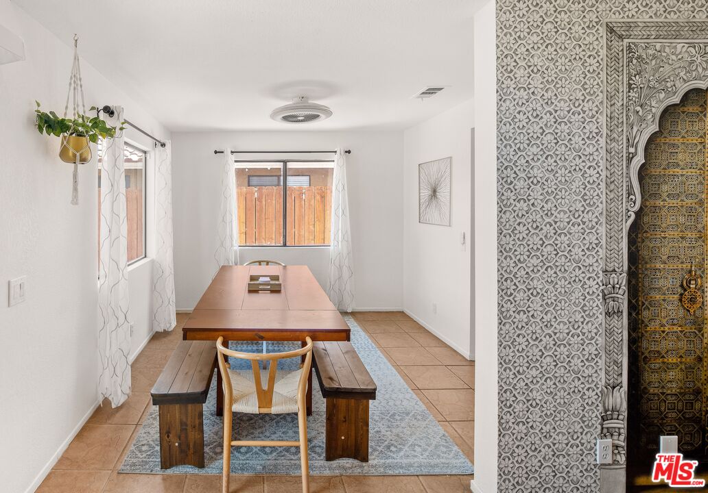45808 Sutter Creek Road Indio, CA 92201 - Photo 12 of 33 a table and chairs in a room