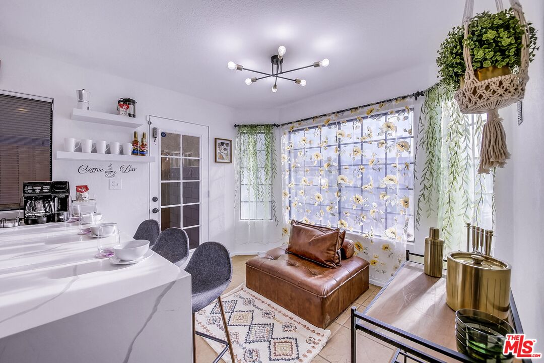 45808 Sutter Creek Road Indio, CA 92201 - Photo 16 of 33 a living room with furniture and a window