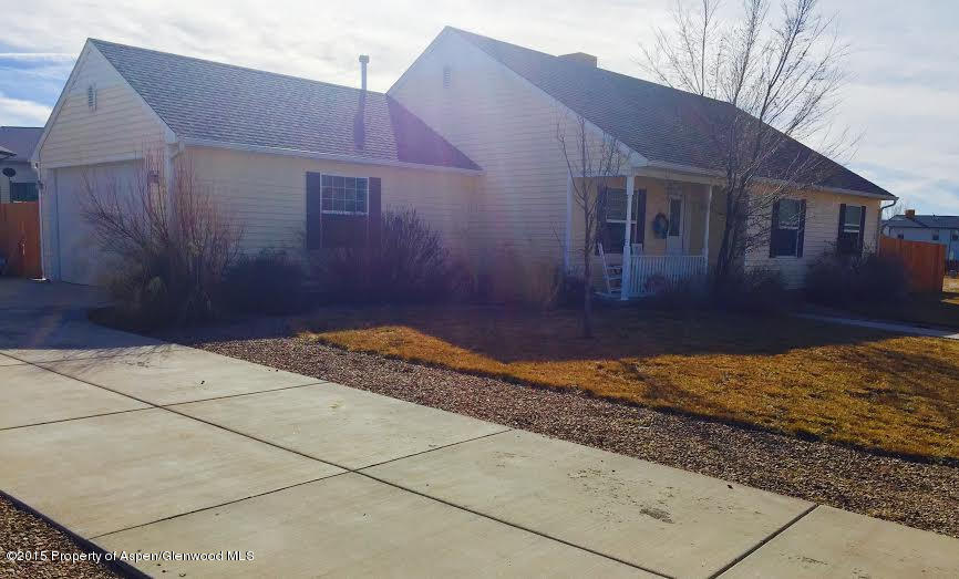 300 Columbine Drive Rifle, CO 81650 - Photo 2 of 8 a view of a house with a yard